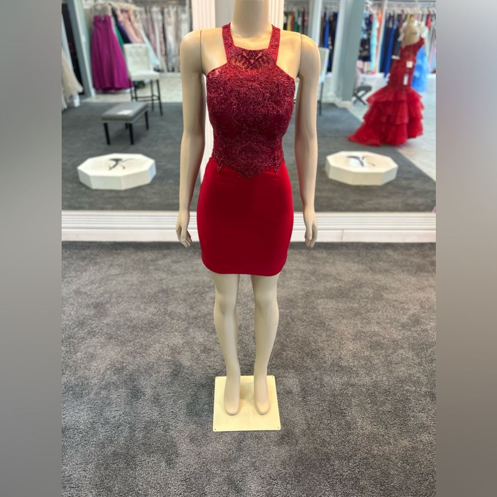 Size 14. burgundy gown. fitting. open keyhole back. knee length